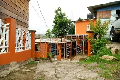 Image de Chambre paradisiaque de John's Town 2