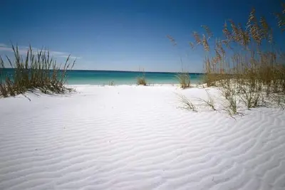 Image de Top Penthouse avec vue sur la plage avec une piscine privée