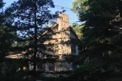 Image de Chalet dans les bois avec vue sur le lac
