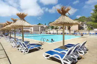 Image de Studio à 400m de la Plage | Parking Gratuit + Accès 2 Piscines