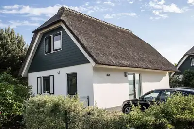 Image de Maison de vacances rénovée à Villaparc Duynopgangh pour 6 personnes, près de la plage
