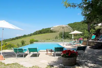 Image de Appartement dans une maison de vacances avec Wifi, piscine, Tv, patio, vue panoramique, parking