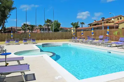 Image de Bel appartement avec piscine, Wifi, climatisation, Tv, patio, animaux admis et parking