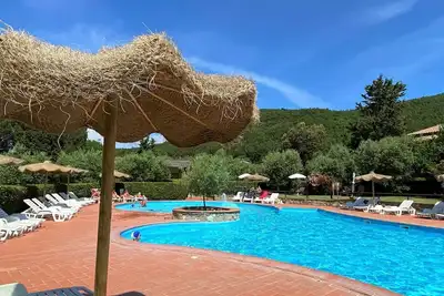 Image de Joli appartement pour 3 personnes avec piscine, Wifi, climatisation, Tv, patio et parking