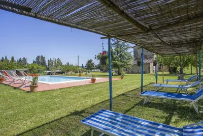 Image de Joli appartement dans une maison de vacances avec Wifi, piscine, Tv, patio, animaux admis et parking