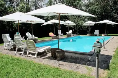 Image de Joli appartement dans une maison de vacances avec Wifi, piscine, Tv, patio, animaux admis et parking