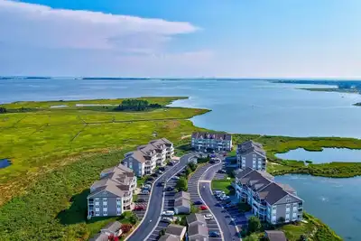 Image de Sweet 2 Br \/ 2 salle de bain complète vue sur l'eau sur la baie avec piscines, golf, tennis, vélos, kayaks et activités gratuites
