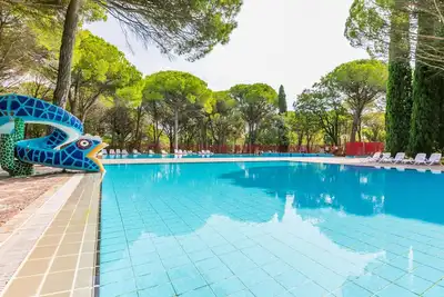 Image de Appartement dans une maison de vacances avec Wifi, piscine, climatisation, Tv, terrasse, parking