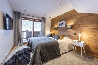 Image de Location Chalet Alya - 12 pers - 5 chambres - Skis aux pieds - Méribel - Piscine