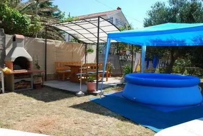 Image de Garçonnière avec la terrasse et la vue sur le mer Barbat, Rab (As-16816-b)