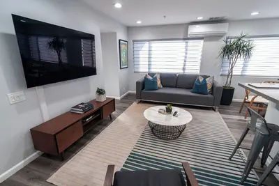 Image de Superbe maison de plage: 2 suites King 2. 5 bains à quelques pas de la plage 6 couchages Jouets Comprennent