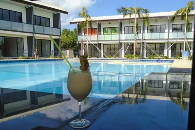 Image de New apartment with large pool and private roof terrace near the beach