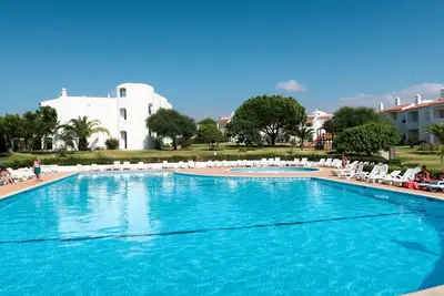 Image de Bel appartement pour 4 personnes avec climatisation, piscine, Wifi, Tv, terrasse et parking