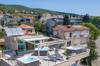Image de Appartement de vacances avec jacuzzi et sauna communs