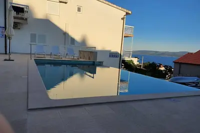 Image de Appartement 1 avec piscine et vue mer imprenable