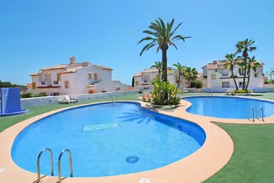 Appartement dans une maison de vacances avec Wifi, climatisation, piscine, Tv, terrasse, parking
