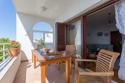 Image de Appartement Sunrise - Appartement 3 Chambres avec Terrasse et Vue sur la Mer