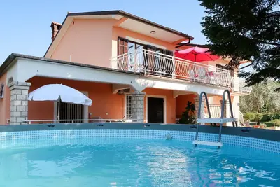Image de Joli appartement pour 6 personnes avec Wifi, piscine, climatisation, Tv, patio et parking