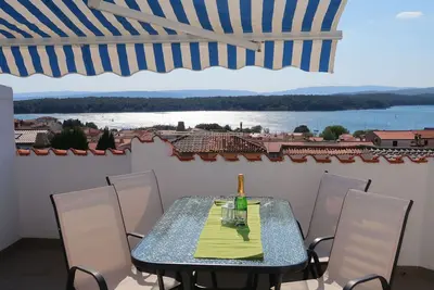 Image de Joli appartement pour 4 personnes avec Wifi, climatisation, Tv, terrasse, animaux admis et parking