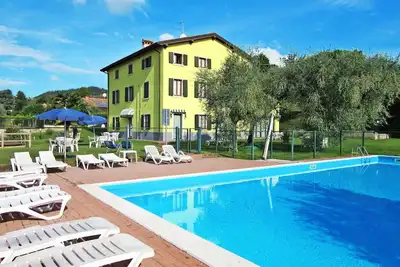 Image de Appartement dans une maison de vacances avec Wifi, piscine, climatisation, Tv, vue panoramique