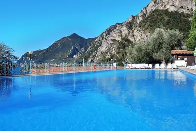 Image de Confortable appartement avec piscine, Wifi, climatisation, bain à remous, Tv, terrasse et parking