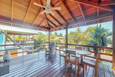 Image de Appartement de vacances lumineux avec cuisine complète, Wi-Fi et câble gratuits et hamac privé
