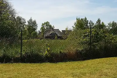 Image de Appartement près de la plage avec jardin