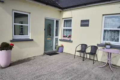 Image de Cosy Farmhouse Cottage avec une vue magnifique
