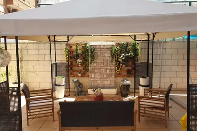 Image de Appartement dans une urbanisation de luxe, rez-de-chaussée, terrasse chill out