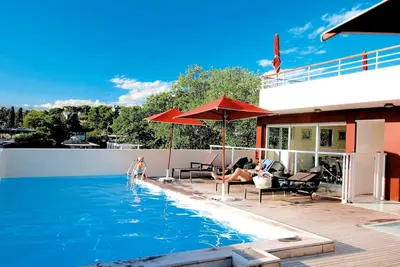 Image de Wi-Fi Gratuit! Appart Climatisée, Accès Piscine en été