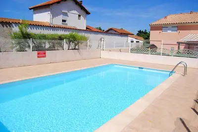 Image de Maisonnette dans résidence avec piscine proche plage