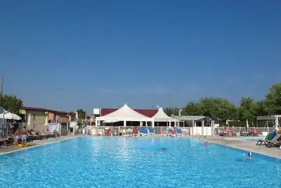 Image de Appartement dans une maison de vacances avec climatisation, Wifi, piscine, terrasse, parking