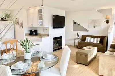 Host By Owner! Family Size Condo! Walk to the Beach & Downtown! Two-car garage!