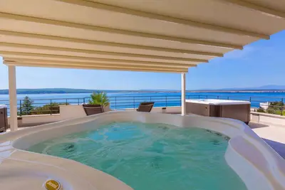 Image de Appartement de vacances près de la plage avec jacuzzi