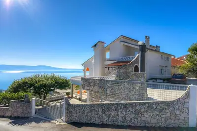 Image de Appartement de vacances avec climatisation et vue sur la mer