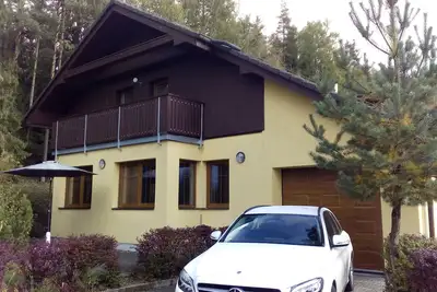 Image de Villa de vacances Nimori avec cheminée à seulement 500m du lac et 100m des remontées mécaniques!