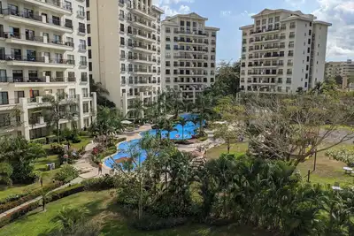 Image de Condo luxueux, 10min à pied de la plage \/ ville, piscine et commodités incroyables!