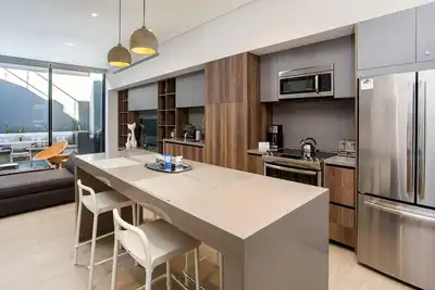Image de Nouveau condo moderne au coeur de la marina! 5 min à pied de la plage de Medano.