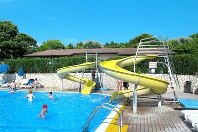 Image de Bel appartement dans une maison de vacances avec Wifi, climatisation, piscine, terrasse et parking