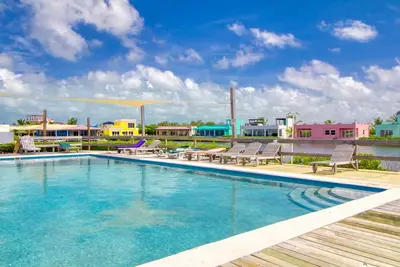 Image de Appartement en front de lagon avec piscine partagée - à pied de la plage