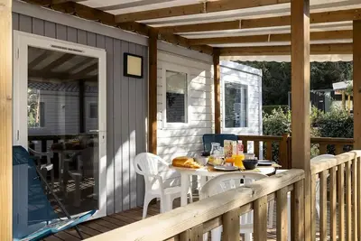 Image de Mobil-home Confort 30m² - 2 chambres + Terrasse couverte + Tv 4 personnes