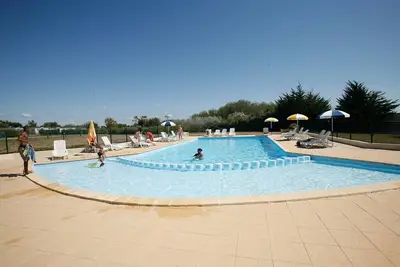 Image de Piscines + Tennis sur place! Mobil-Home proche des Plages