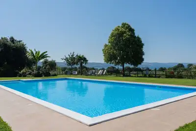 Image de Confortable appartement dans une maison de vacances avec piscine, Wifi, Tv, terrasse et parking