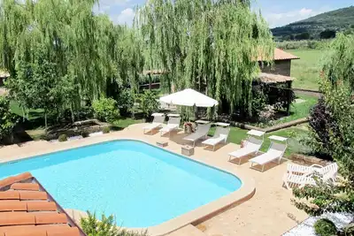 Image de Appartement dans une maison de vacances avec Wifi, piscine, Tv, patio, vue panoramique, parking