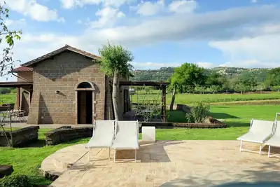 Image de Bel appartement dans une maison de vacances avec piscine, Wifi, Tv, patio, vue panoramique, parking