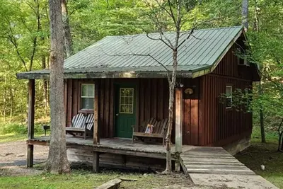 Image de Cabine 1 chambre confortable avec mezzanine supplémentaire, cuisine complète et coin salon
