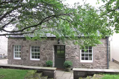 Image de The Arns Cottage is a traditional stone built, cosy and luxurious retreat.