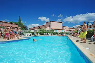 Image de 250m de la Plage + Accès Piscine! Maison de Vacances Abordable