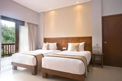 Image de Suite privée à Ubud, pour 2 personnes, entourée d'une végétation luxuriante