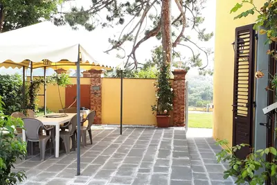 Image de Appartement Margherita, partie d'un complexe de ferme avec piscine